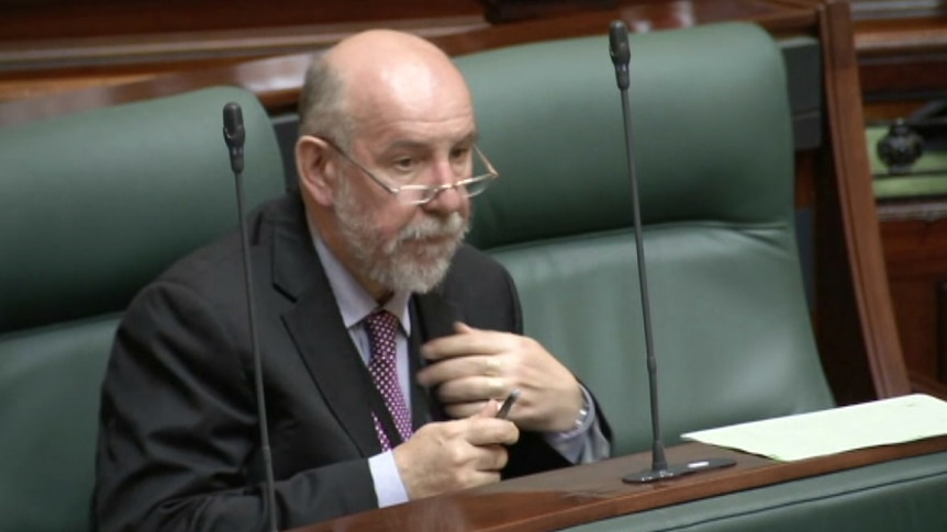 Don Nardella sits in state parliament, and watches on proceedings.