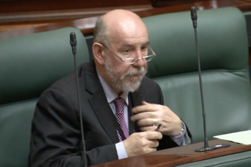 Don Nardella sits in state parliament, and watches on proceedings.