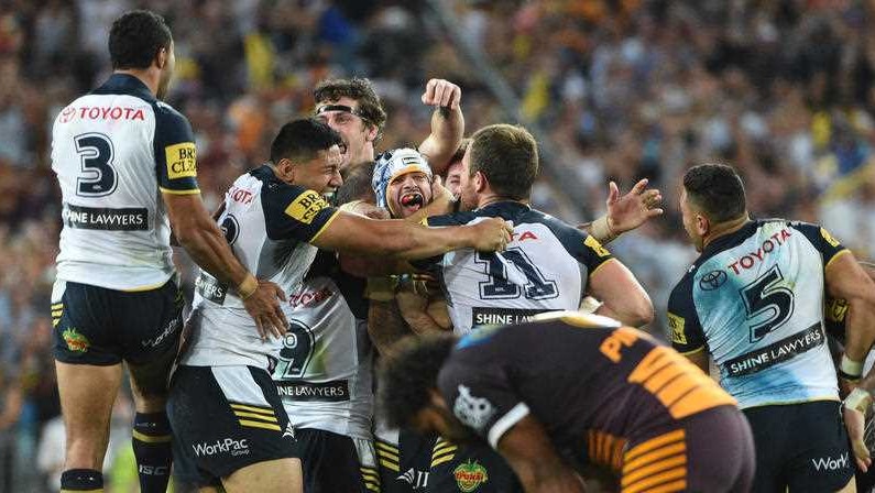 Cowboys co-captain Johnathan Thurston celebrates after winning the NRL grand final against Brisbane.
