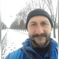 Pavel Kuljuk stands in a deserted snow covered park in eastern Ukraine