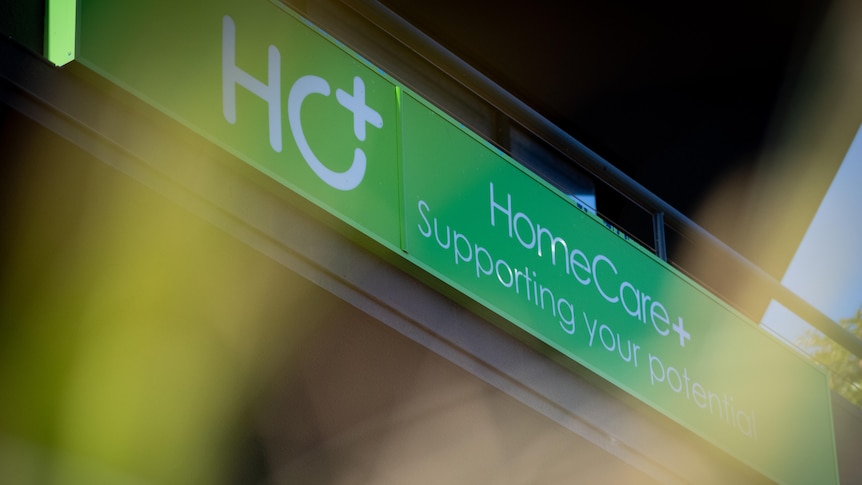 A green sign saying HomeCare Supporting your potential