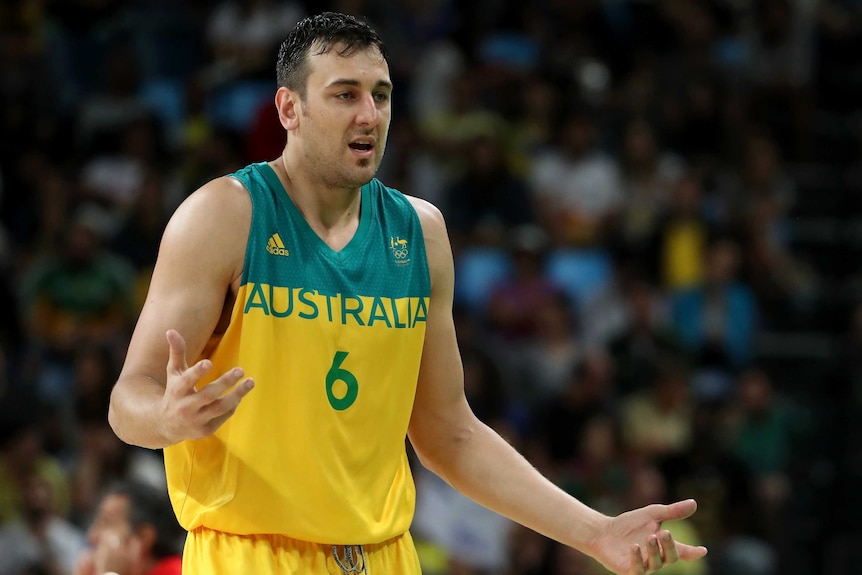 Australia's Andrew Bogut reacts after fouling out from the men's basketball bronze medal match