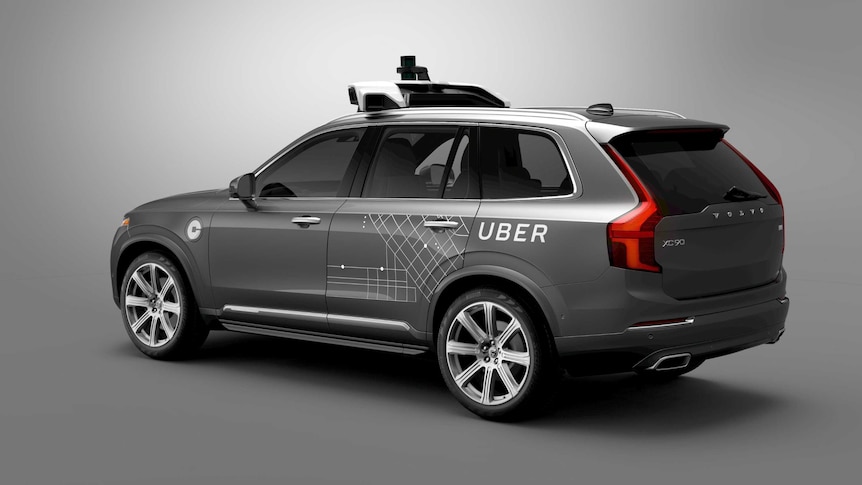 The exterior of an Uber-branded, self-driving Volvo.