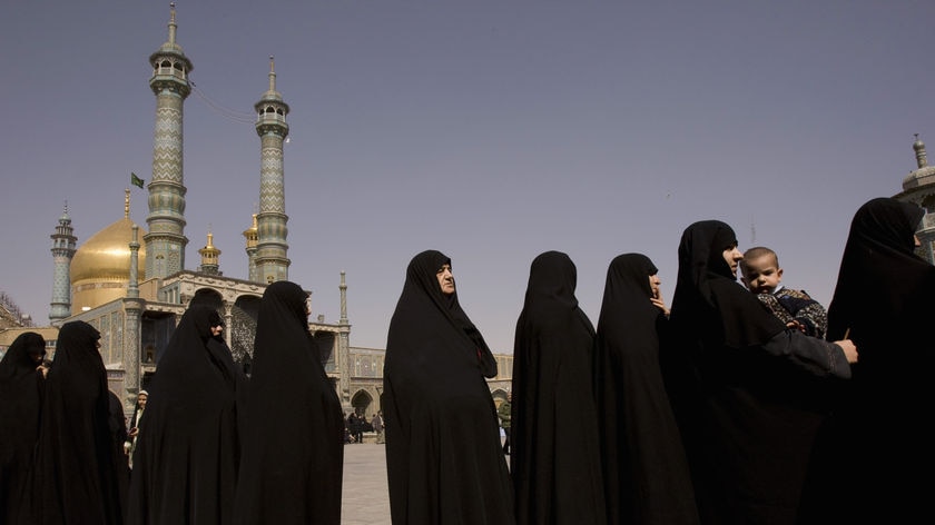 Iranian women line up to vote in parliamentary elections