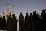 Iranian women line up to vote in parliamentary elections