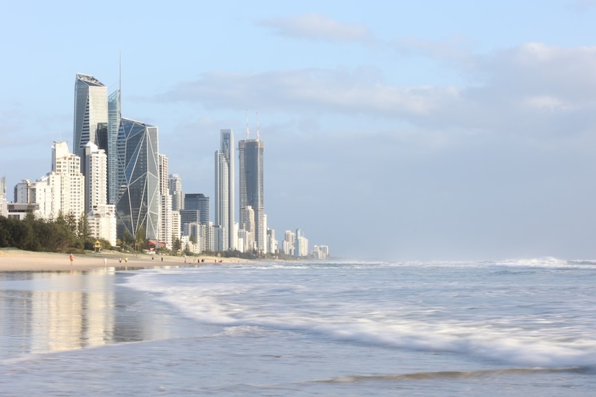 Beach with gold coast skyline behind.