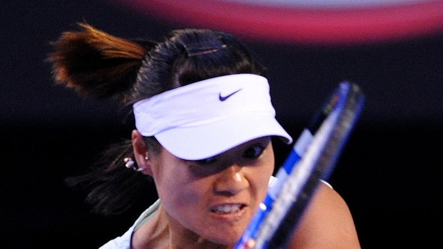 Early advantage ... Li Na hits a backhand against Kim Clijsters in the first set