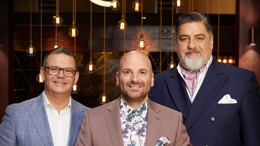 MasterChef judges Gary Mehigan, George Calombaris and Matt Preston wearing suits.