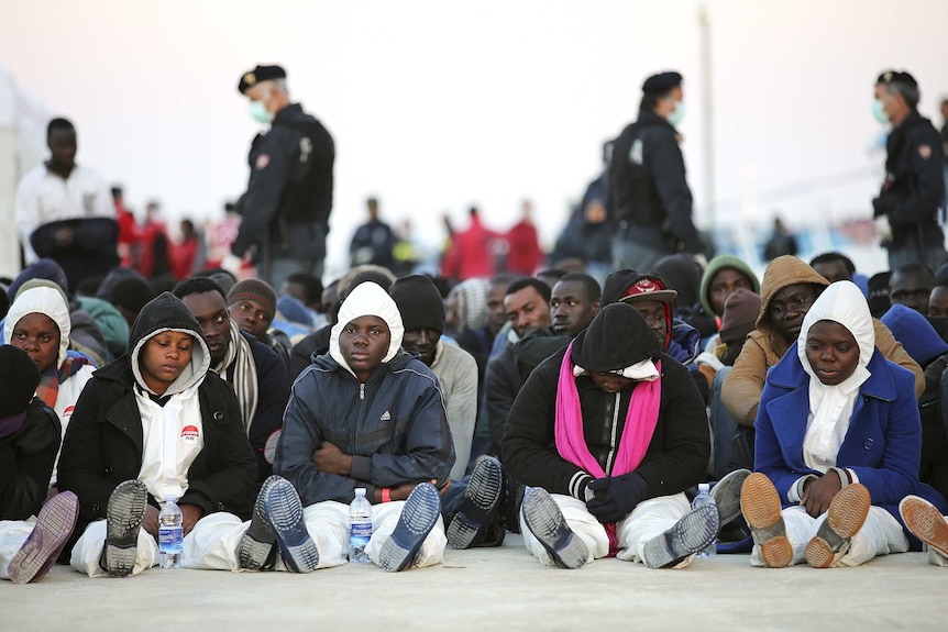 Migrants at the Sicilian harbour of Augusta