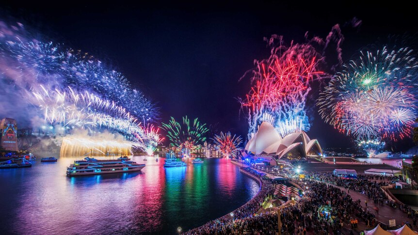 Sydney Harbour Bridge lights up during the New Year's Eve fireworks display.