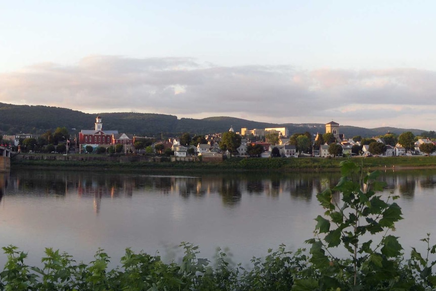 A picture of a small American town taken from a bridge