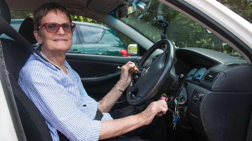 Sue Salthouse operates her hand-controlled car.