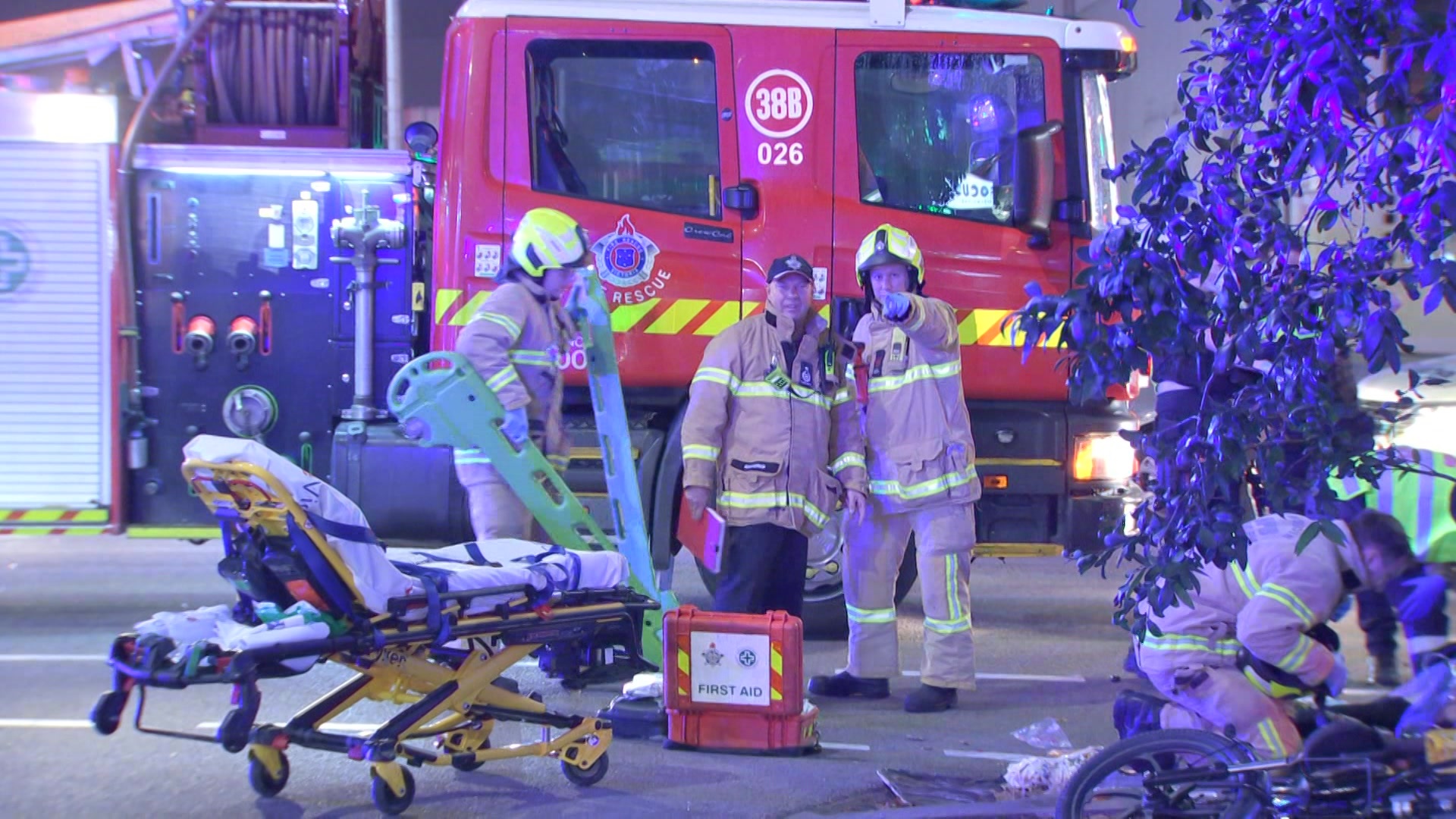 Emergency workers at an accident scene.