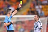 Leigh Broxham gets a yellow card