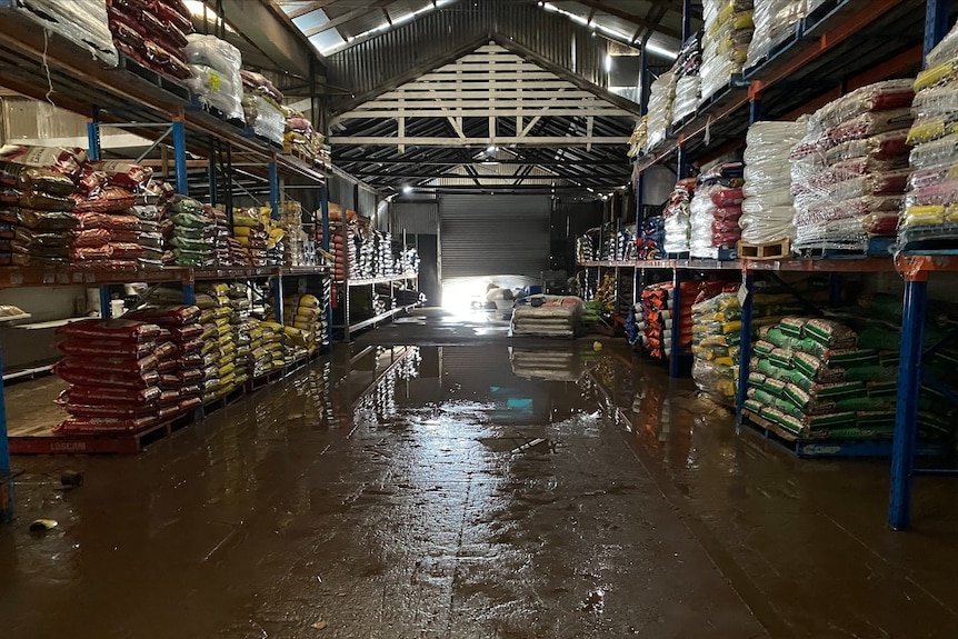 Flood-damaged rural store business after about one metre of water swept through the building 