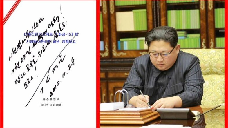 Kim Jong-un signing the order for the launch of the new Hawsong-15 missile.