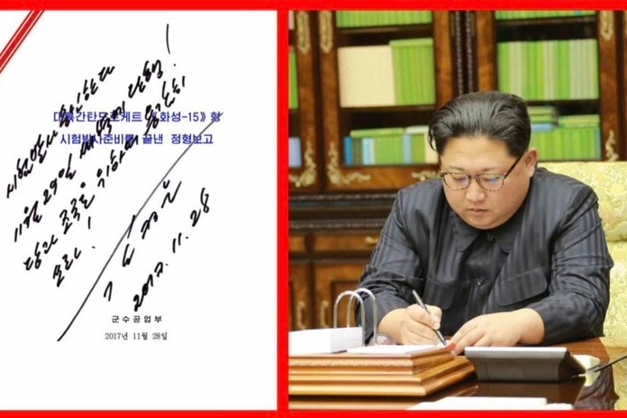 Kim Jong-un signing the order for the launch of the new Hawsong-15 missile.