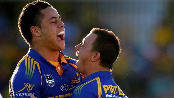 Jarryd Hayne (L) and Tim Smith celebrate a Parramatta try in their drubbing of the Broncos.