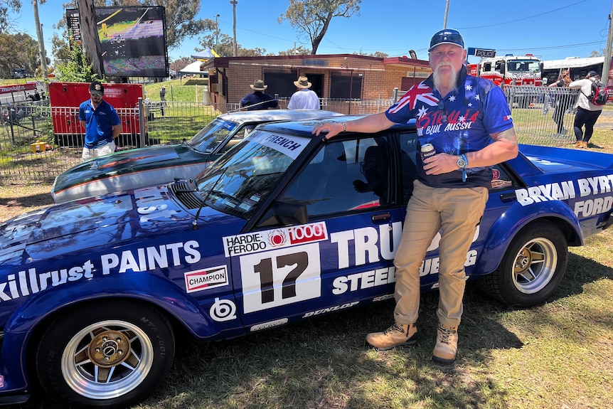 Man standing with his retro Ford at the Bathurst 1000