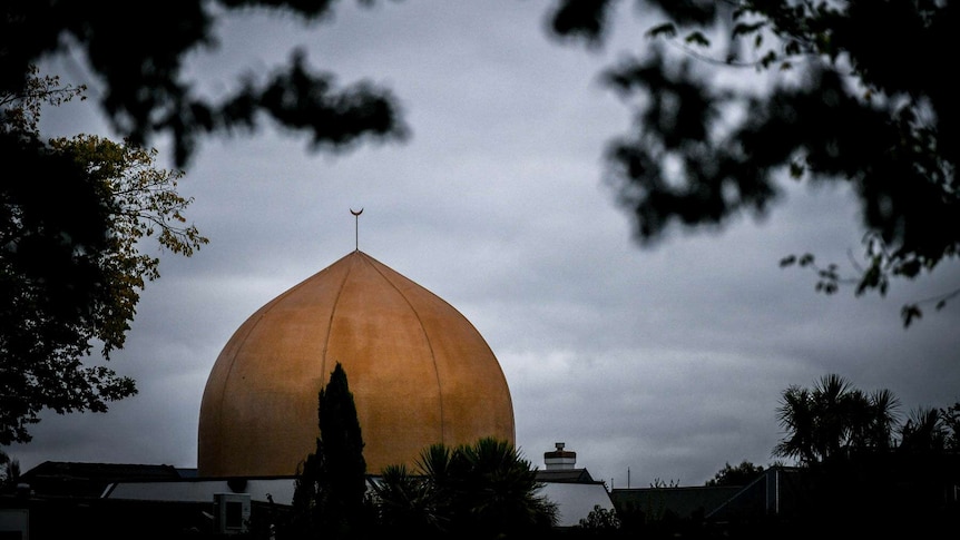 A memorial on Deans Avenue in Christchurch for the shooting victims looks over one of the scenes of the massacre.