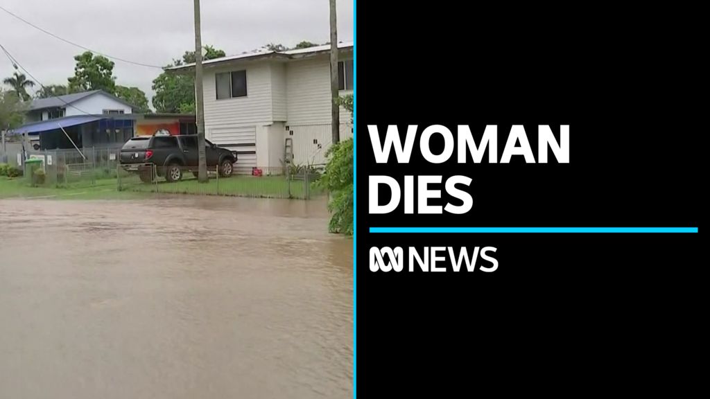 Woman dies in floodwaters as rainfall pummels Queensland - ABC News