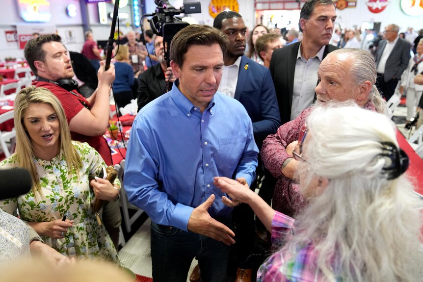 Ron DeSantis greets audience members during a fundraising picnic for U.S. Rep. Randy Feenstra