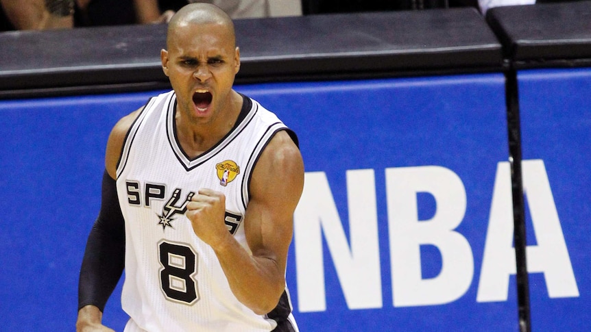 Patty Mills celebrates San Antonio Spurs winning the NBA title