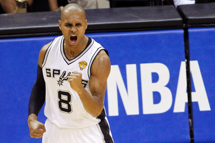 Patty Mills celebrates San Antonio Spurs winning the NBA title