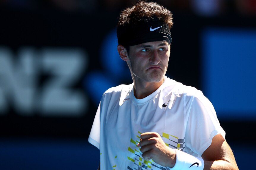 Bernard Tomic came back from almost certain defeat after surrendering the second-set tie-break.