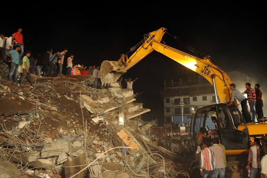 Rescuers search for survivors from Mumbai building collapse