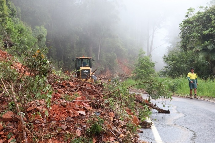 Rubble covers the Eastern Dorrigo Way at Coramba after a landslip caused by heavy rain.