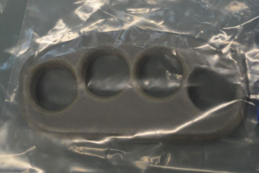 Plastic knuckle dusters police believe were made with a 3D printer