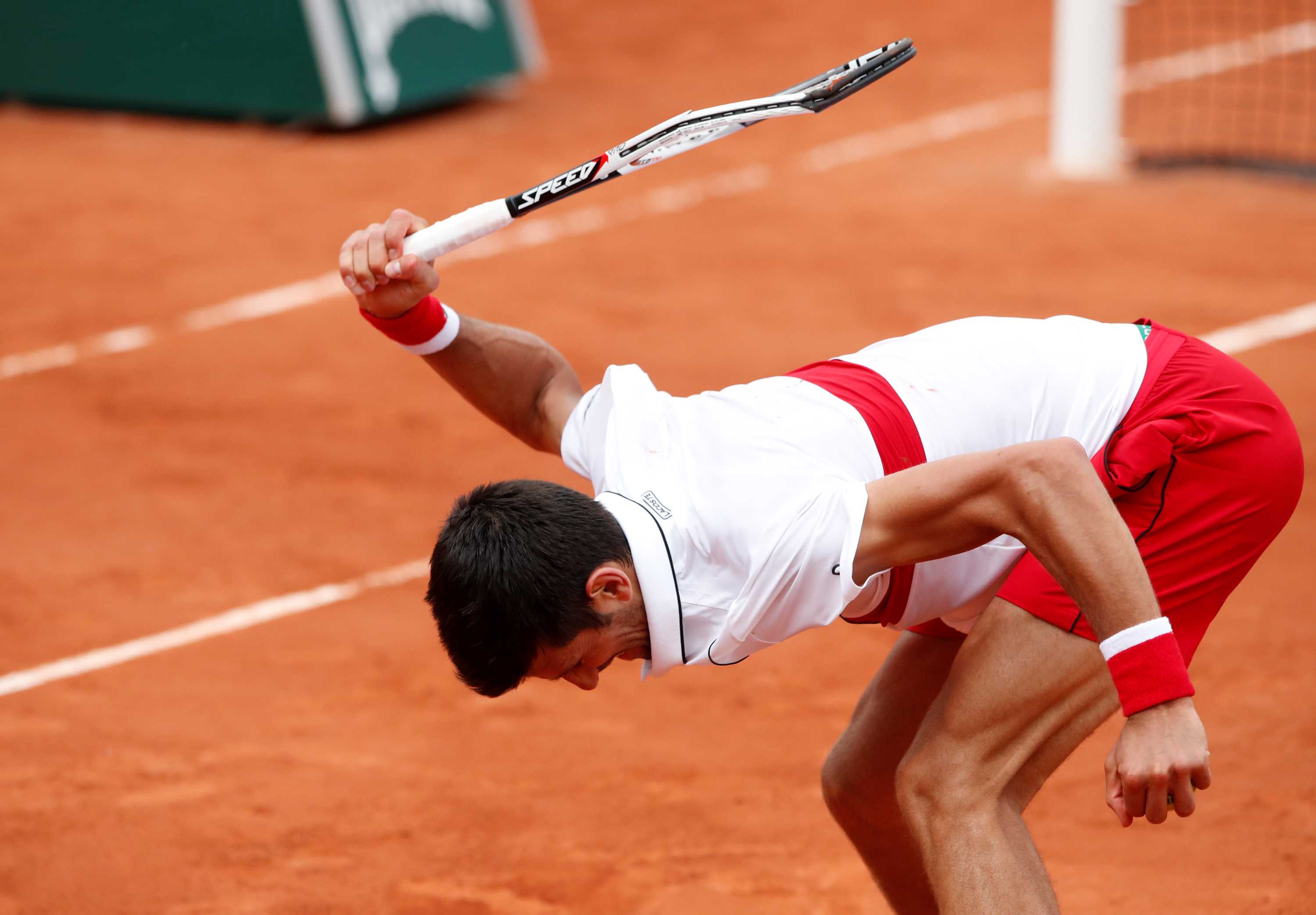 djokovic racket smash