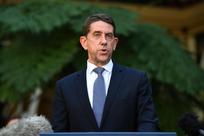 Queensland Treasurer Cameron Dick speaks at a press conference in Brisbane