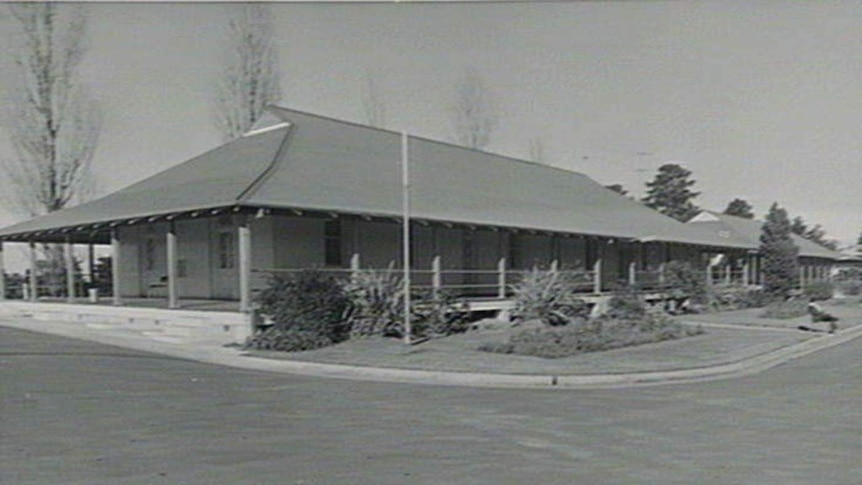 A building of the Mount Penang Training School captured in black and white