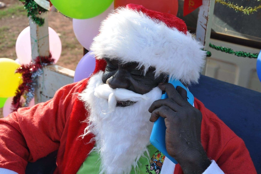 Santa receives a phone call in Ramingining