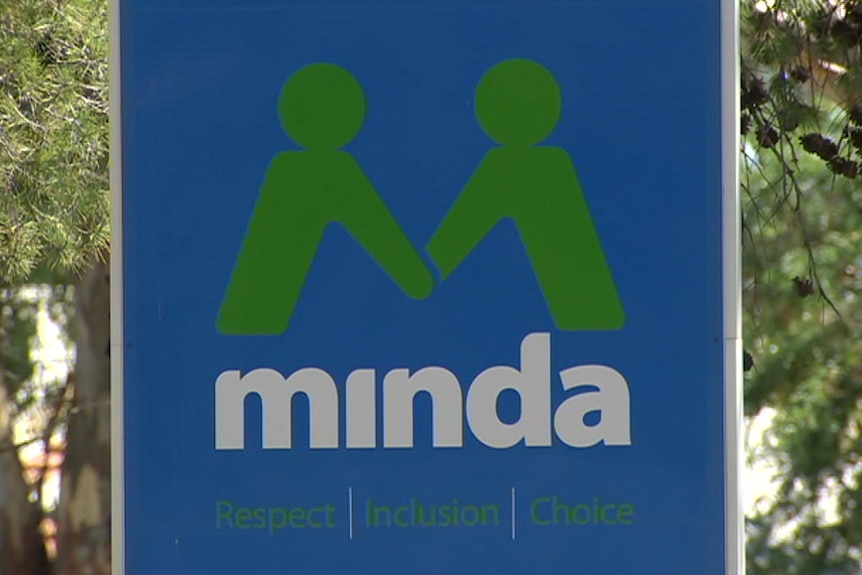 A sign saying Minda