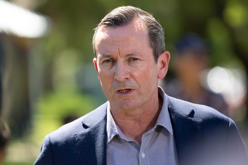 A close-up of WA Premier Mark McGowan at a press conference outdoors.