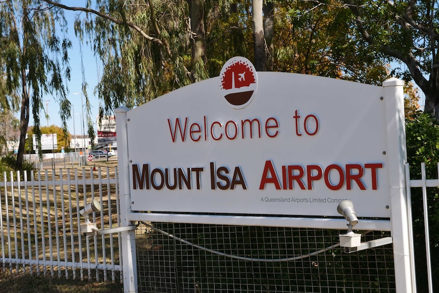 A photo of the sign outside the Mount Isa airport, which is a welcome sign.