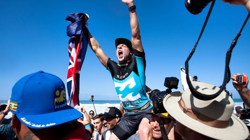 Mick Fanning celebrates his third ASP world title