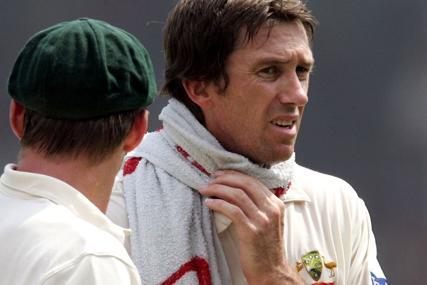 Glenn McGrath wraps a towel around his neck