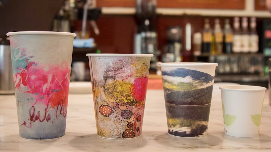 Four different sized takeaway coffee cups.
