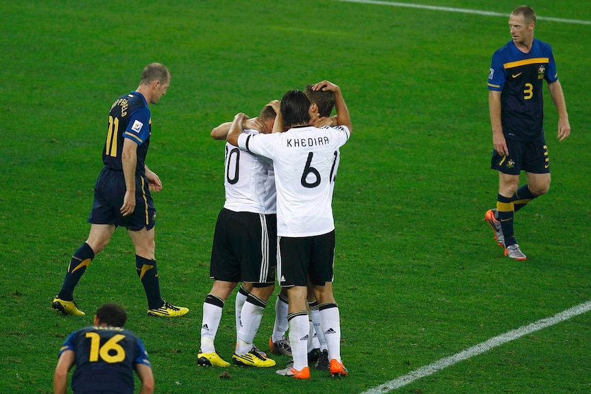 Germany celebrates their rout of the Socceroos