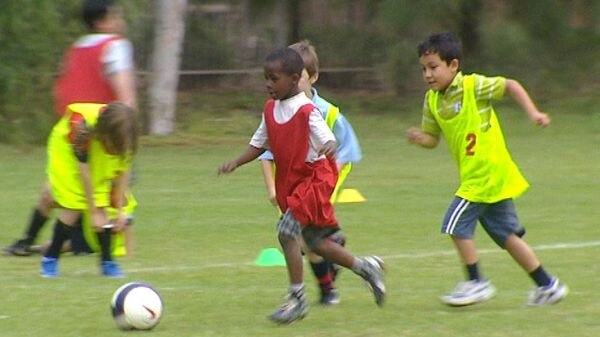 These refugee children at a recent soccer clinic in Adelaide were coached by Adelaide United players