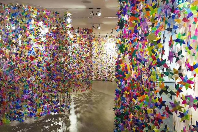 Thousands of ribbon stars hang on display