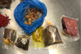 Plastic bags filled with uncooked pork, eggs and other foods illegally brought into Australia in a traveller's luggage.