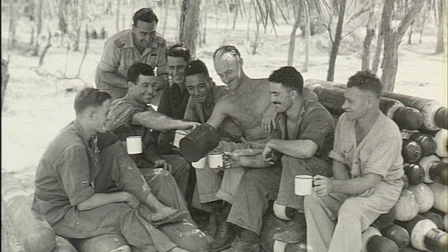 Royal Australian Air Force personnel have a cup of team while on break from duties on Horn Island during WWII.