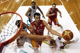 Chris Anstey drives to the basket during game two of the finals