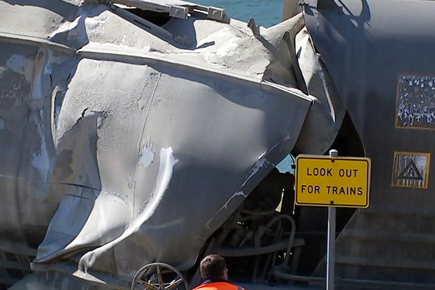 Damaged train after derailment