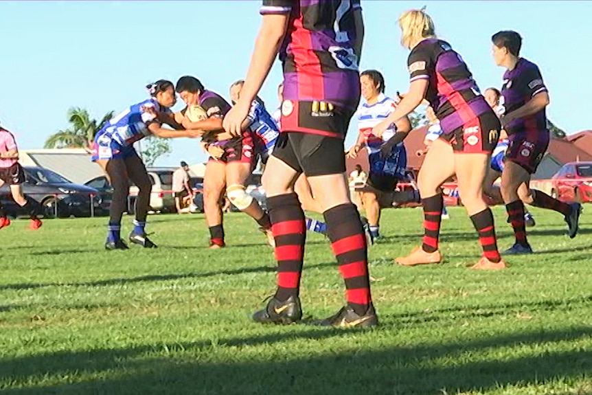 A Toowoomba Valleys Fillies player attacks the line of the defence.